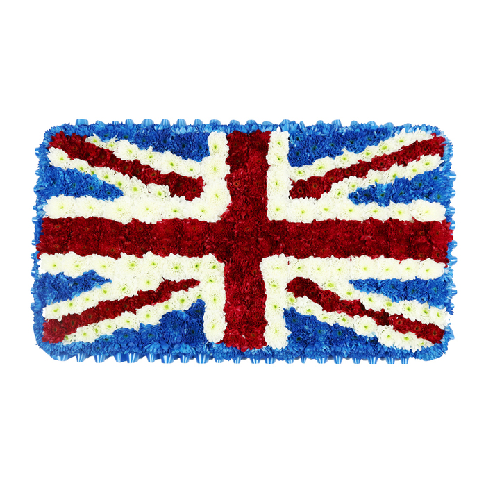 This image shows a carefully constructed floral representation of the Union Jack, presented as a low, rectangular tribute piece ideal for a coffin top, easel, or display at a memorial. Every section of the flag is built from dense, small-headed flowers placed side by side so that no gaps of foliage or foam show through, giving the entire surface a plush, tapestry-like feel. The outer perimeter and corner blocks are formed from rich blue blooms, possibly hydrangea or compact spray asters, which together create a deep, almost velvety backdrop. Across this field, a strong red St George's Cross dominates the centre, made of tightly clustered red flowers that look slightly raised, adding gentle depth and drawing the eye immediately to the heart of the design. Diagonal red stripes of St Patrick's Cross intersect this, each one edged and defined by crisp white flowers, whose clean petals catch the light and sharpen the flag's familiar pattern. The broad white diagonals of St Andrew's Cross are also formed in these same white blooms, creating a balanced interplay of colour that remains true to the national emblem. No ribbons or additional greenery distract from the patriotic design; it is purely floral, purely flag. The arrangement radiates a sense of honour and remembrance, suitable for services in Epping and the surrounding countryside, perhaps carried from a family home near Epping Forest to a quiet graveside or placed as a centrepiece during a local Remembrance Day ceremony. It feels like the work of a seasoned local florist, someone used to translating personal stories and national pride into delicate, living petals.
