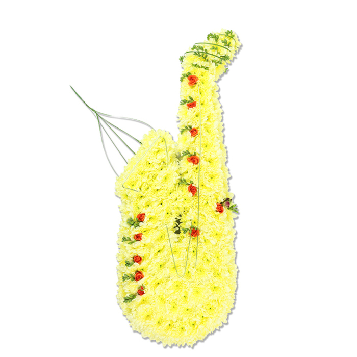 A large, custom-made floral tribute in the clear, recognisable shape of a saxophone is displayed upright against a plain white background, allowing every detail of the craftsmanship to stand out. The entire surface of the instrument is covered with clusters of bright yellow chrysanthemum florets, each bloom set closely together so no gaps of foam or structure are visible, creating a continuous, soft-textured skin over the curved body, long stem, and flared bell of the saxophone. Interspersed throughout this golden blanket of petals, small rich red spray roses, some still in tight bud, are placed precisely where the instrument's keys and intricate mechanisms would normally appear, forming a pattern of dots and lines that suggest music in motion. Woven delicately through the flowers, thin strands of dark green foliage or ivy trace important contours: up the sweeping neck, around the generous curve of the bell, and along the length of the main body, adding definition, contrast, and a lifelike sense of depth. Near the top, at the position of the mouthpiece, a few fine green or metallic wires rise and curl slightly, hinting at both the reed and the subtle internal supports needed to keep this sculptural design so perfectly upright. The flowers look fresh and luminous, as though arranged the same day by an experienced florist familiar with Epping's local services and family traditions around farewell tributes. This striking memorial piece would feel at home at a funeral or celebration of life in Epping, perhaps honouring a saxophonist, jazz enthusiast, or cherished music lover whose personality was as bright and warm as the yellow blooms themselves.