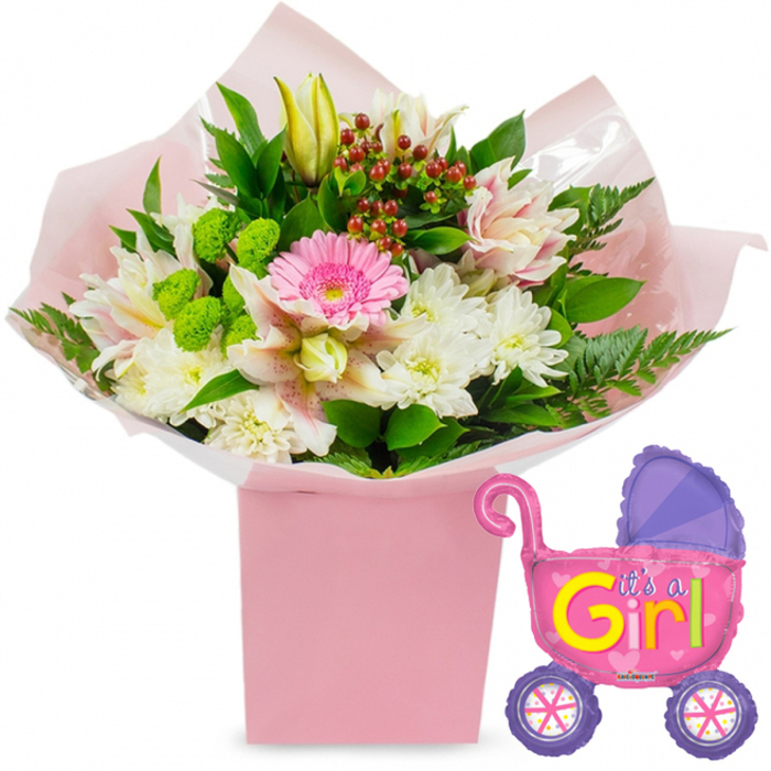 This image showcases a thoughtfully crafted baby girl celebration set, perfectly composed against a pure white background so that every blossom and ribbon of colour can be appreciated. At the centre sits a tall, square, light pink gift box, brimming with a lush bouquet that looks freshly arranged by a local Epping florist. The flowers are cradled in layers of soft pink tissue paper and clear cellophane, their edges catching the light like delicate satin. A single bright pink gerbera daisy forms the focal point, its wide, symmetrical petals opening in a joyful circle. Around it, clusters of snow-white chrysanthemums offer a gentle, cushion-like texture, while elegant alstroemeria lilies unfurl in shades of light pink and white, some petals speckled delicately as if dusted by hand. A closed yellow lily bud peeks from the top left, carrying a sense of anticipation for blooms yet to open, much like the early days with a newborn in a quiet Epping lane near the station or the High Street. Nestled between the main flowers are lime-green button-style blooms, their vivid colour providing lively contrast. Sprigs of deep red hypericum berries punctuate the arrangement, intertwining with glossy dark green leaves and arching fern fronds that frame the bouquet. To the right, a metallic foil balloon in the shape of a baby stroller brings a charming, playful note. The balloon is predominantly hot pink, with a deeper purple hood and two purple wheels, each decorated with bright, multicoloured spokes. Bold, bubbly lettering in yellow and green announces It's a Girl!, accompanied by tiny heart accents. The overall composition radiates joy and tenderness, ideal for illustrating newborn celebrations, baby shower gifts, or same-day flower delivery for proud new parents welcoming their daughter home in Epping.
