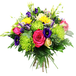 Set against a clean white backdrop, this exuberant, hand-tied bouquet looks as though it has been gathered from a particularly colourful corner of a garden near Epping Forest. Its shape is full and rounded, densely packed so that blooms and foliage almost spill towards the viewer. At its heart, hot pink roses unfurl in generous, velvety layers, their rich colour anchoring the design. Clustered beside them, lime green spider chrysanthemums add a lively, contemporary twist; their long, fine petals splay outwards like fireworks frozen in motion, creating a vivid chartreuse halo. Deep indigo and royal purple lisianthus flowers meander through the bouquet, some open with soft, ruffled edges, others still in elegant buds that promise future colour, giving the arrangement a sense of ongoing life. Bright yellow gerberas or similar daisy-like blooms bring warmth and optimism, their rounded centres and radiating petals evoking clear sunshine over Epping's market streets. A single cream-to-pale-yellow rosebud nestles lower in the design, its tightly spiralled petals providing a gentle, romantic note. Tiny filler blossoms in soft pink and lavender tuck themselves between the larger flowers, while slender green buds and stems add vertical rhythm and a feeling of fresh growth. Surrounding it all is a lush cradle of foliage: fern fronds with feathery texture, smooth oval leaves, and eucalyptus-like sprigs, their rich greens intensifying the surrounding colours. The careful hand-tied stems, though not visible, are suggested by the neat, domed composition and slight outward tilt of each bloom. This bouquet feels joyful and celebratory, ideal as a centrepiece for a family gathering in Epping or as a same-day delivery surprise to brighten a friend's home near the High Street.