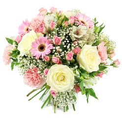 A round, hand-tied bouquet brimming with pastel blooms is shown against a crisp white background, highlighting the gentle interplay of cream, blush, and soft green tones. Several fully opened cream roses sit proudly at the centre, their layered petals forming elegant rosettes that suggest classic romance and timeless style. Nestled alongside them are clusters of pink spray roses, some still closed like tiny promises, others partially open, adding a sense of movement as if the bouquet is slowly waking up to the day. Cheerful pink gerbera daisies, unmistakable with their neat, flat petals and dark central discs, add a bolder note of colour, echoing the lively atmosphere of Epping's café-lined streets and weekend markets. Pale pink carnations introduce a nostalgic charm, their ruffled edges reminiscent of vintage garden borders, while white alstroemeria blooms lend an airy dimension, each petal marked with fine, painterly streaks that reward a closer look. Fine sprays of baby's breath weave through the arrangement, forming misty white clouds that soften the transitions between larger flowers and give the bouquet a light, celebratory feel. Fresh green leaves and stems thread through the design, adding depth and a sense of freshly gathered abundance, as though just brought in from a carefully tended garden on the outskirts of Epping. The stems are neatly bound at the bottom, demonstrating the considered touch of a professional florist familiar with local tastes. This bouquet, radiant yet gentle, feels perfect for sending quiet congratulations, welcoming a new baby home near Epping Station, or simply delivering a message of affection and hope on a bright Essex morning.