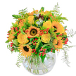 Radiating the bright exuberance of an Epping summer's afternoon, this bouquet is a celebration of colour and joy. At its center, towering sunflowers with velvety, dark hearts beam outward, their golden petals casting a warm glow that feels like sunlight filtering over Epping's fields. Among these iconic blooms, yellow roses spiral open, their creamy petals promising happiness and heartfelt celebration. Splashes of bright orange petals and groups of shiny red berries add lively contrast, mirroring the cheerful vibrancy seen during local Epping festivals. Wispy fern fronds edge the arrangement, their movement suggesting a gentle breeze drifting through the town's open parks. Carefully gathered in a round glass vase, the bouquet lets stems twist and mingle naturally, creating a sense of unstudied abundance and freshness. The bouquet's subtle fragrance-green and just a touch sweet-evokes both garden mornings and the welcoming air of expert local floristry. Designed to delight, this arrangement brings a sunbeam of cheer to birthdays, thank-yous, or simply to infuse any Epping home with the warmth and vitality of a perfect summer's day.