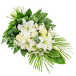 A serene, one-sided funeral spray in shades of white and green lies against a crisp white background, its form tapering from a full top to a more pointed lower right, like a natural cascade of flowers arranged for a farewell service in Epping or nearby Loughton. The focal point is a cluster of large white lilies, their generous, satin-like petals curving outward to reveal soft green throats and delicate stamens, while a few closed buds reach upward, adding height and suggestion of ongoing remembrance. Around these, creamy white roses and ruffled carnations nestle together, their rounded shapes and layered petals giving the centre of the spray a plush, comforting fullness. Scattered among them are neat white gerbera-style blooms with subtle dark or yellow centres, bringing a contemporary touch and gentle contrast. Fine white filler flowers nestle between the larger heads, creating a light, airy texture, like a soft mist drifting between leaves in Epping Forest. The surrounding foliage is abundant and varied: broad, polished green leaves provide a strong base, light feathery ferns soften the composition, and rounded eucalyptus leaves in muted blue-green tones bring an understated elegance. Some long, slender leaves have been folded and bound into neat vertical accents, showing the florist's careful design. From the lower right, a fan of slim palm fronds extends outward, giving the arrangement its elongated, asymmetrical profile and lending a sense of gentle movement. This thoughtful tribute, designed to be viewed from the front, conveys purity, peace, and heartfelt condolence, suitable for funerals, memorials, or graveside tributes throughout the Epping area.