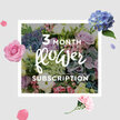 In this photograph, a thoughtfully styled bouquet from a three-month flower subscription rests as if just placed on a table in a light-filled Epping living room. At the centre, rounded blue hydrangeas create a cool, cloud-like base, their countless small petals overlapping in soft layers that draw the gaze inward. Around these, roses in gentle shades of blush pink and lilac sit at different stages of bloom, some with tight, promising buds, others fully open to reveal their intricate, velvety spirals. Slender lisianthus stems weave between the larger flowers, their frilled, fluttering petals and delicate buds lending an airy grace that keeps the arrangement feeling light rather than heavy. Lush green foliage frames the pastel blooms, the various textures of leaves-some smooth, some slightly serrated-giving structure and echoing the greenery of nearby Epping Forest. The palette is soothing and harmonious, a blend of pastel blues, pinks, and purples softened by cool greens, and the lighting is gentle, as though the bouquet is catching the last of the afternoon sun through a window facing the High Street. Subtle shadows and highlights emphasize the curves of each petal and the fullness of each flower head, while the imagined scent is a mix of fresh, floral sweetness and crisp green stems. This image suggests a sense of ongoing care: month after month, a similar bouquet arriving at the door, ready to be placed in a favourite vase, quietly transforming everyday spaces into calming, uplifting corners of the home and reflecting the peaceful, close-to-nature character of Epping itself.