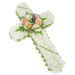 A solemn and exquisitely arranged floral cross is shown against a pure white background, its design clear and uncluttered, allowing the viewer to focus entirely on the tribute itself. The cross is generously padded with countless small, pure white chrysanthemums, placed shoulder to shoulder to form a smooth, gently textured surface that speaks of innocence, peace, and quiet reflection. Around the very edge of the cross runs a continuous trim of lively green foliage, framing the white blooms with a crisp, natural outline. This green border accentuates the familiar Christian cross shape from the top, along both arms, and down to the base, giving the design a finished, carefully considered appearance. At the central intersection, a slightly elevated cluster of larger flowers creates a warm focal point. Here, roses in soft peach and blush tones mingle with creamy ivory blooms, each flower opening with velvety petals that feel tender and comforting. They are supported by airy fern fronds, delicate curls of bright green grass, and tiny touches of complementary purple filler flowers, adding depth and a touch of gentle colour without overwhelming the calm palette. The lighting is even and soft, helping the white and green tones to appear fresh and true. This type of floral cross is often chosen for funerals or memorial services in and around Epping, perhaps for ceremonies held near Epping High Street or quiet burials on the edge of the forest, offering a heartfelt symbol of faith, remembrance, and loving farewell.