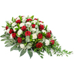 A beautifully composed funeral spray lies imagined against a clean white background, its elongated form running gently from left to right like a soft, floral arc. On the left, the arrangement is fuller and higher, then slowly diminishes into a refined, trailing tip on the right, suggesting movement and a gentle farewell. Rich red roses, their petals tightly wrapped and velvety, are grouped and spaced throughout, drawing the eye with their deep, almost wine-dark hue. Between these, clusters of pure white carnations unfurl their many-layered petals, creating a plush, ruffled texture that feels both tender and comforting. The flowers are supported by a generous bed of foliage: strong, broad, dark green leaves anchor the base, while stems of eucalyptus with their subtle silvery-green tone weave in and out, adding a cooler accent and a sense of airy lightness. At the far right, finer shoots of lighter green greenery extend beyond the main body of the spray, creating a graceful cascade that appears to drift gently away from the central mass of blooms. The overall composition balances formal structure with natural ease, evoking respect, remembrance, and a quiet wish for peace. This kind of red and white tribute is typical of memorial flowers chosen by families in Epping, suitable for resting on a casket, placing by a graveside, or adorning a remembrance table at a local chapel, where its rich colours and soft textures can offer a comforting focus for shared grief and loving reflection.
