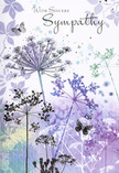 This sympathy card unfolds like a quiet visual poem, echoing the serenity of a calm evening walk along Epping's country paths. Across the front stretches a delicate stand of wildflowers, their silhouettes airy and refined, painted in thoughtful shades of lavender, indigo, and soft blue. Each slender stem rises with an elegant curve, supporting umbels of tiny blossoms that look almost weightless, as if drifting upward toward a pale sky. The background is a dreamy wash of cool watercolours-muted purples melting into silvery greens and faint blue-grey-suggesting distant fields and hedges gently fading into the horizon beyond Epping Forest. Pale petals and hints of foliage float across this backdrop, not sharply defined, but softly diffused, as though seen through a light veil of mist. Here and there, butterflies pause near the blooms, their translucent wings etched with only the faintest touches of colour, evoking transformation, gentle presence, and the quiet persistence of love. The overall palette is calm and cool, yet comforting, more like a soothing whisper than a loud statement. It helps to steady the mind and ease the heart, much as a thoughtful bouquet from a trusted local florist might do when delivered to a home in Epping during a difficult time. On the card, the words of sympathy-simple, sincere, and written in a graceful script-rest in harmony with the floral illustration. Every detail works together to convey understated warmth, offering a respectful embrace woven from nature's softest colours and tender lines.